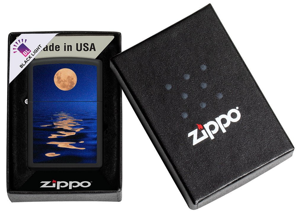 Full Moon Design Black Light Black Matte Windproof Lighter in its packaging.