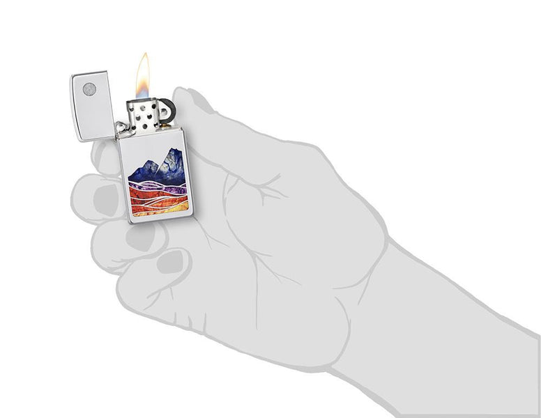 Slim® Landscape Design High Polish Chrome Windproof Lighter lit in hand