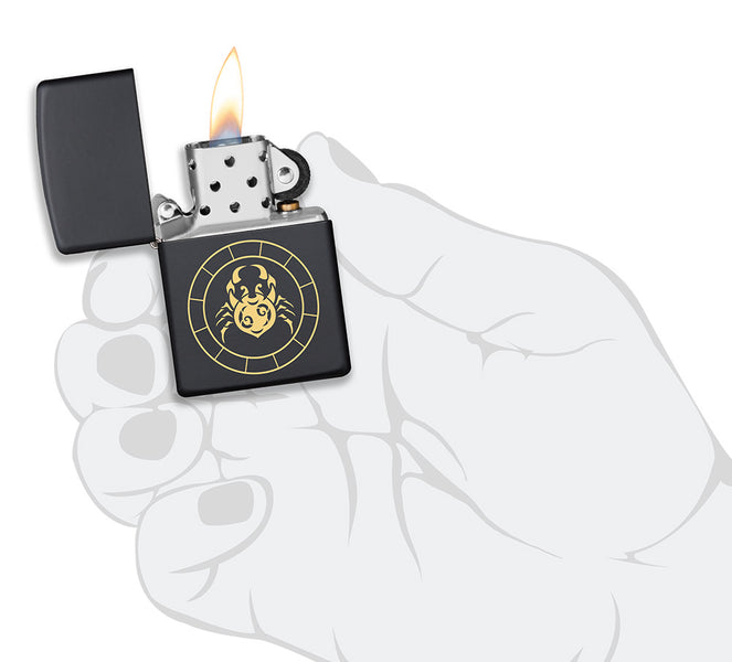 Cancer Zodiac Sign Design Black Matte Windproof Lighter lit in hand