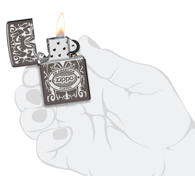 Zippo American Classic Windproof Lighter lit in hand.